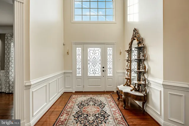 a view of a deck with chairs and wooden floor