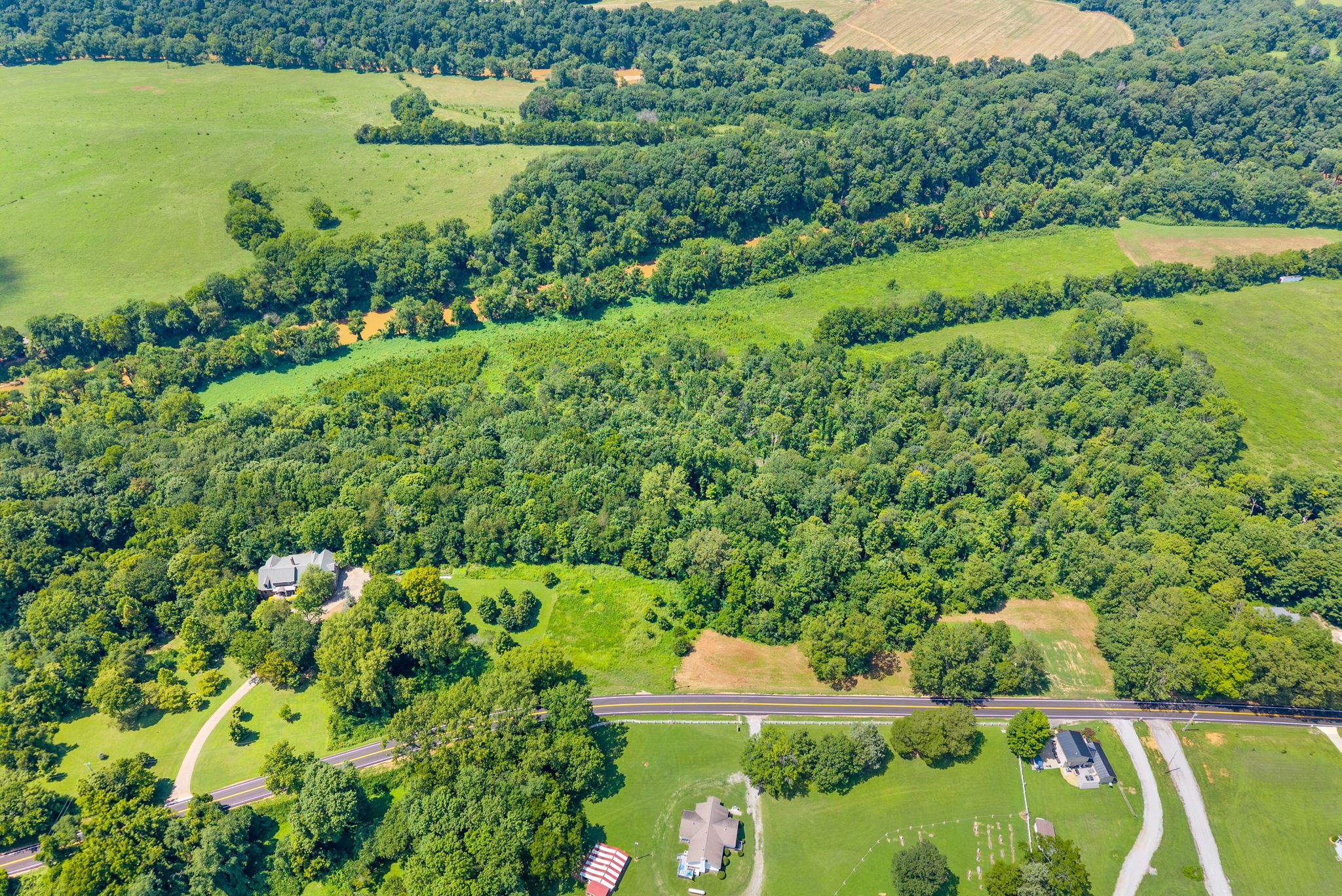 0 Old Clks Sprgfield Road Adams, TN 37010 - Photo 16 of 33 an aerial view of a houses with a yard