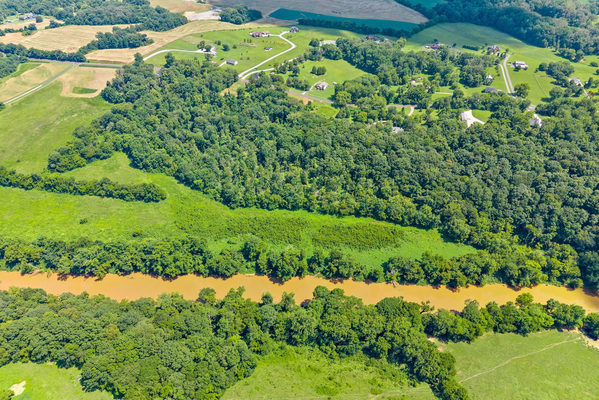 0 Old Clks Sprgfield Road Adams, TN 37010 - Photo 21 of 33 a view of a garden with a building
