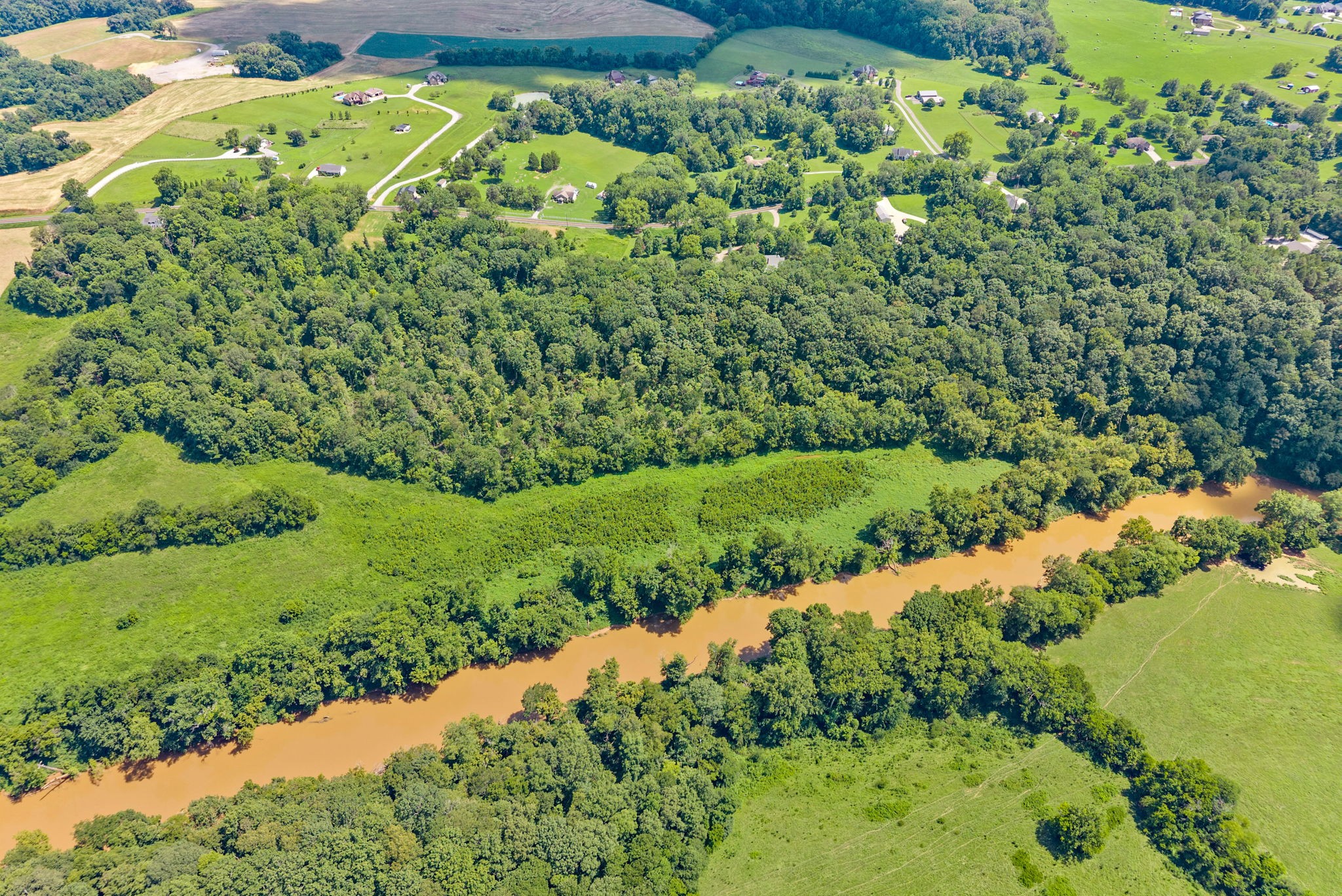 0 Old Clks Sprgfield Road Adams, TN 37010 - Photo 22 of 33 a view of a garden with a building