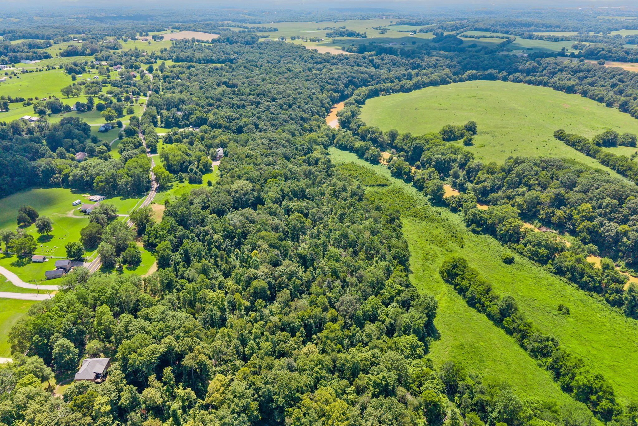 0 Old Clks Sprgfield Road Adams, TN 37010 - Photo 26 of 33 an aerial view of a residential houses with outdoor space and trees all around