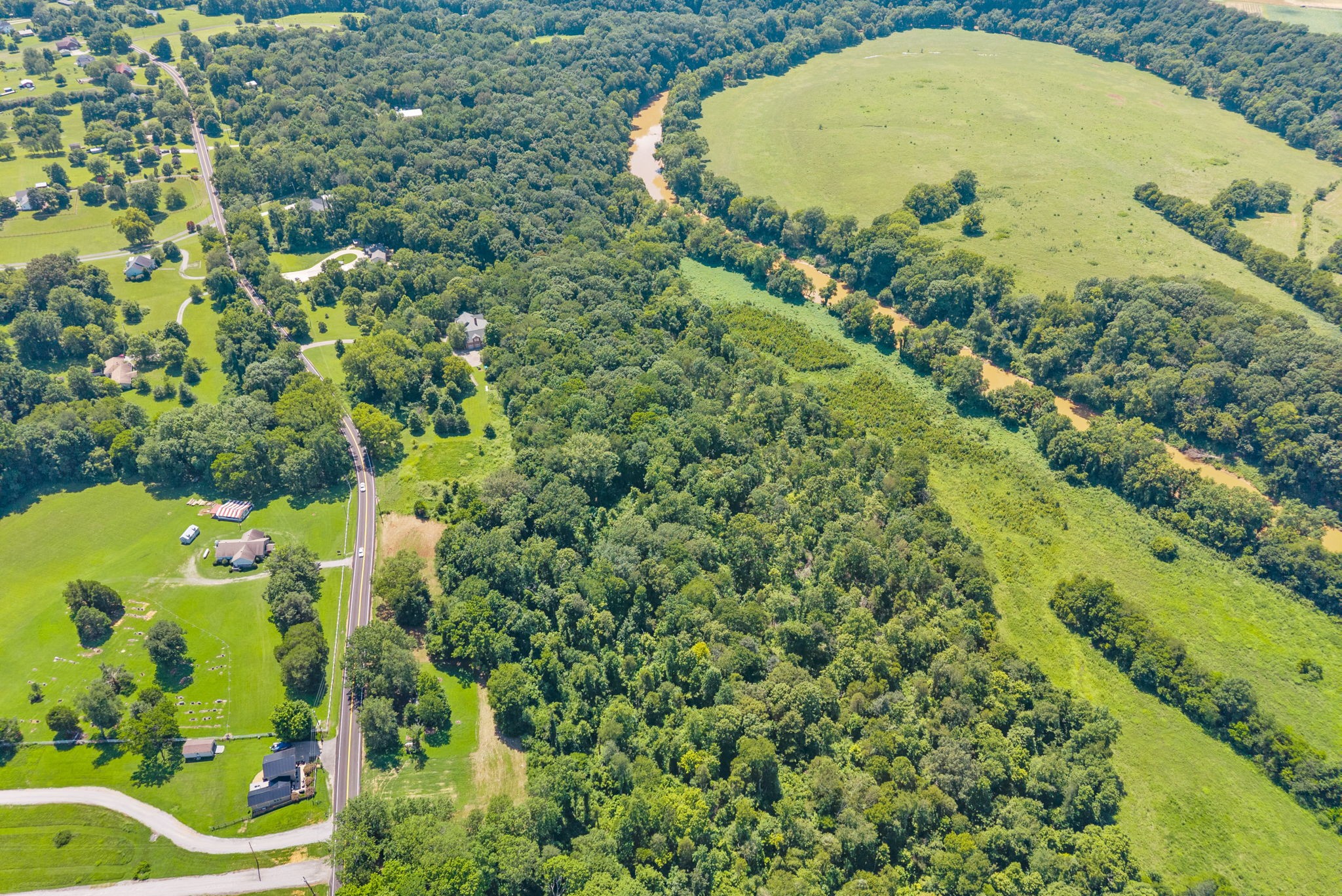 0 Old Clks Sprgfield Road Adams, TN 37010 - Photo 31 of 33 an aerial view of a residential houses with yard and swimming pool