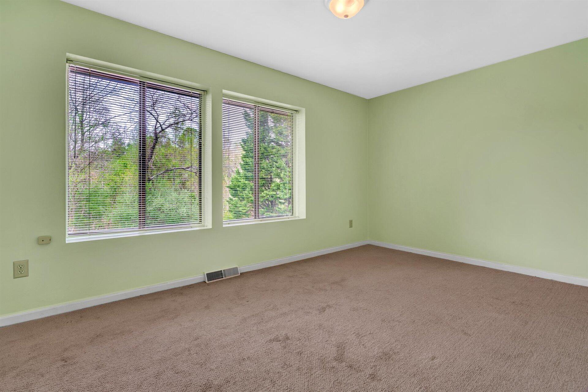 202 Harbor Ridge Drive Goodview, VA 24095 - Photo 12 of 30 an empty room with a window