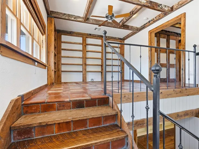 a balcony view with an outdoor seating