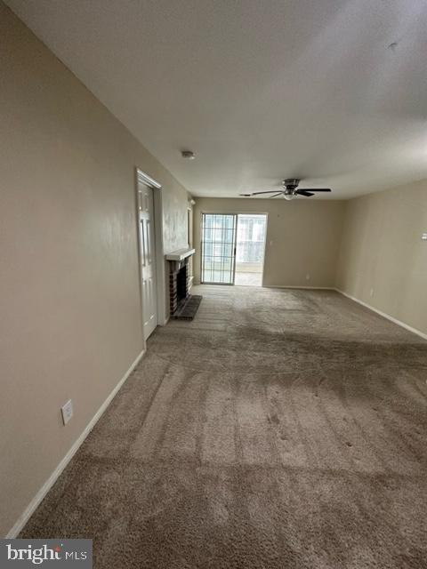 602 Squire Lane, Unit D Bel Air, MD 21014 - Photo 13 of 28 a view of an empty room with a fireplace