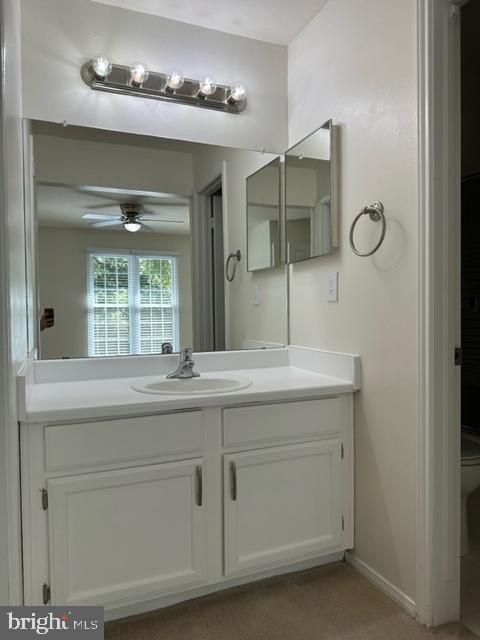 602 Squire Lane, Unit D Bel Air, MD 21014 - Photo 26 of 28 a bathroom with a sink and a mirror