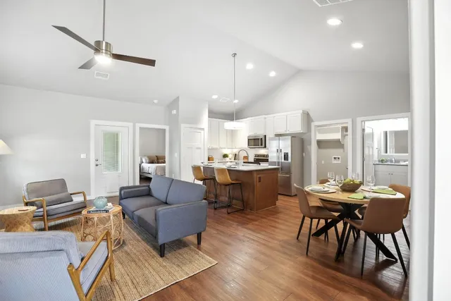 a balcony with furniture and a potted plant