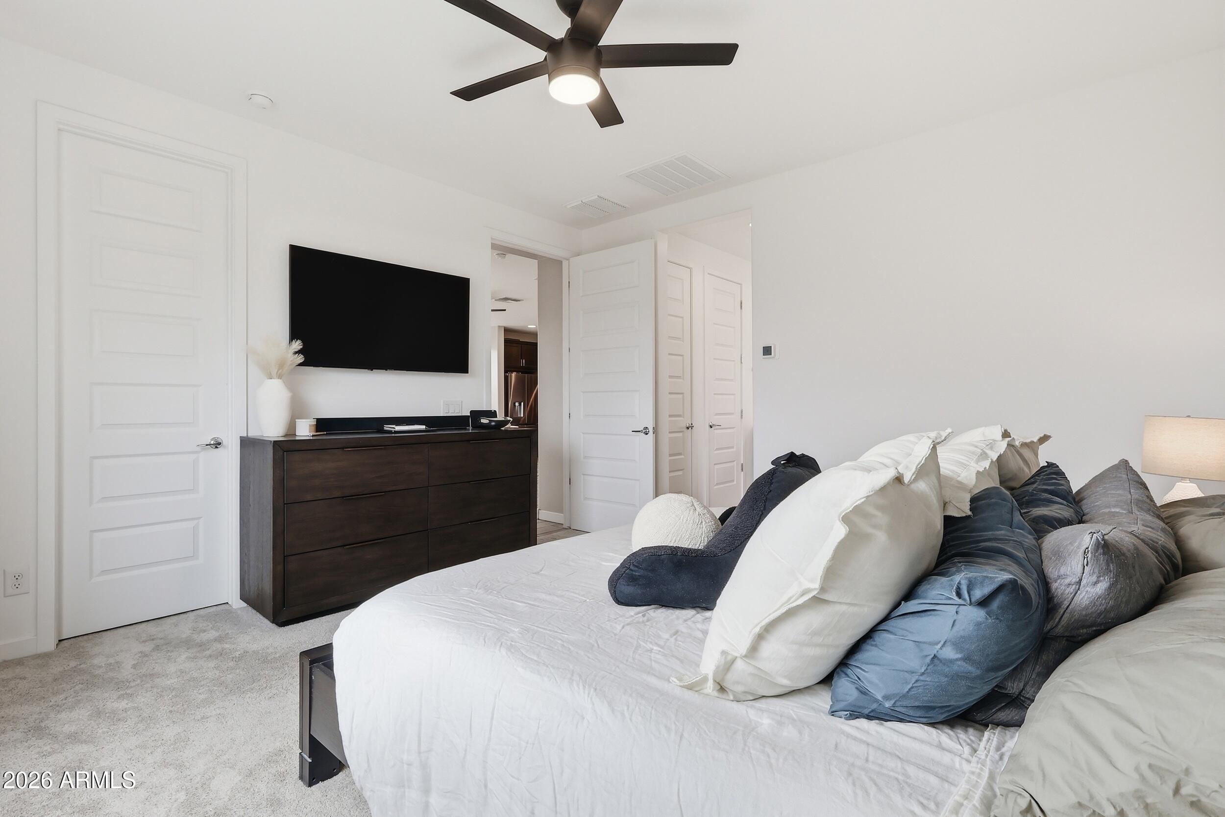 2323 West Grenadine Road Phoenix, AZ 85041 - Photo 15 of 33 Primary bedroom