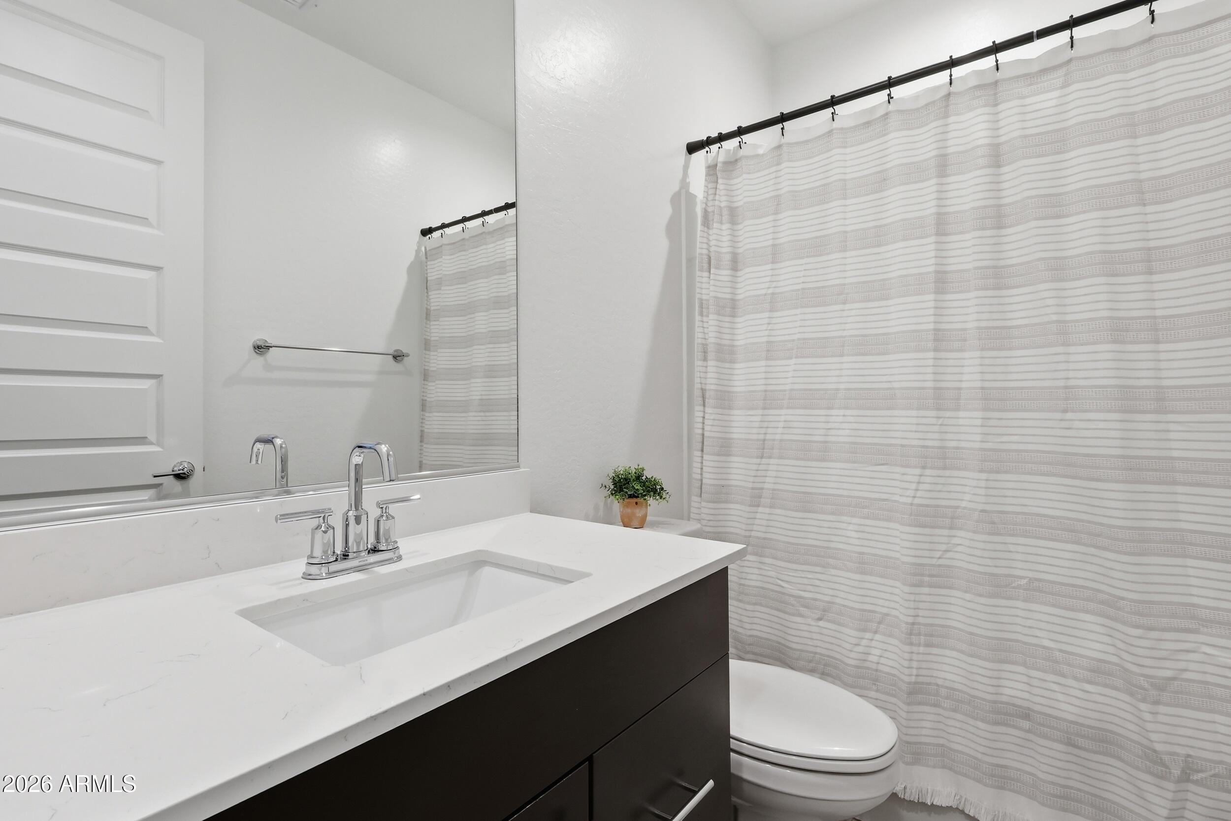 2323 West Grenadine Road Phoenix, AZ 85041 - Photo 26 of 33 Guest bathroom 2