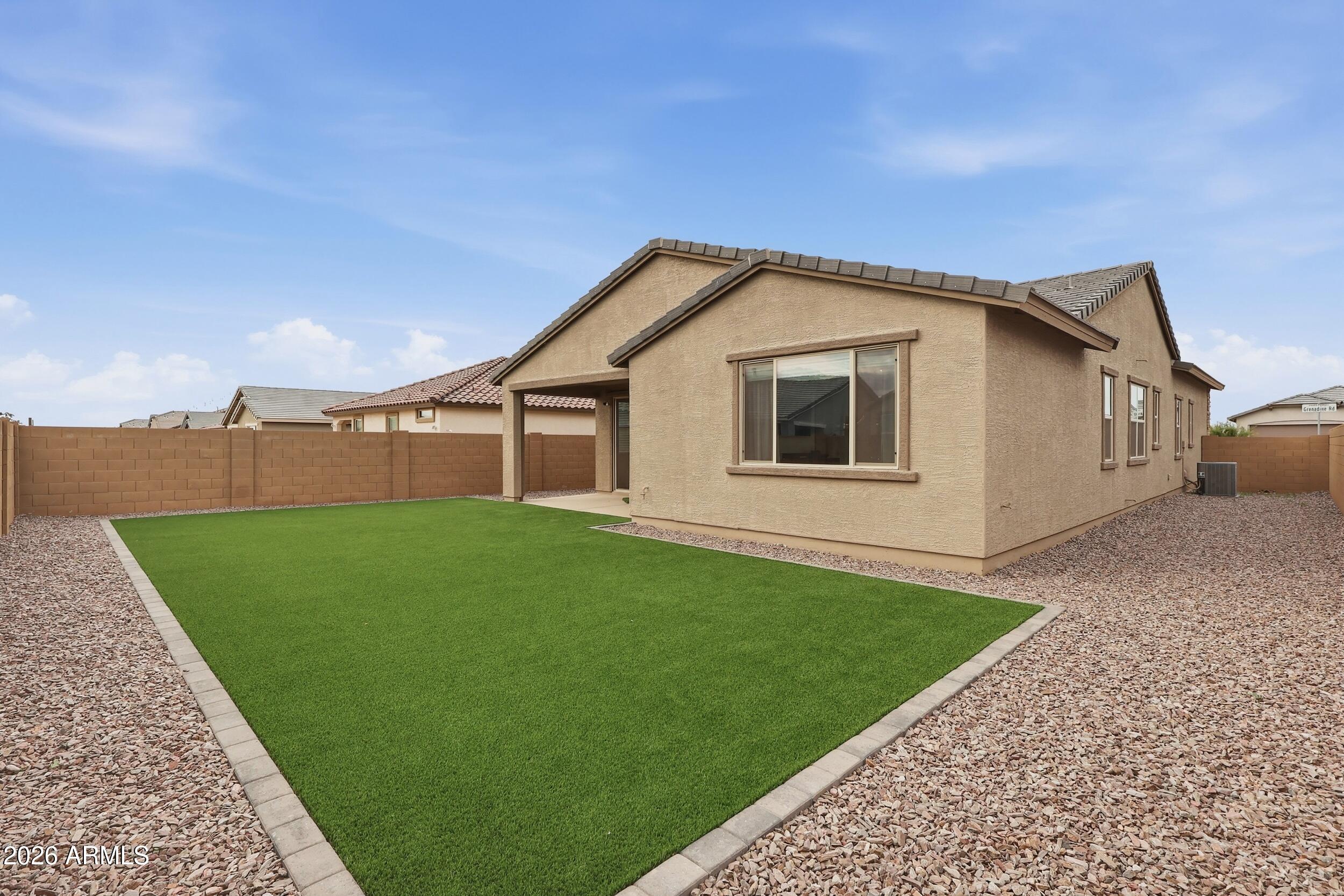 2323 West Grenadine Road Phoenix, AZ 85041 - Photo 30 of 33 Thousands of dollars into new landscapin