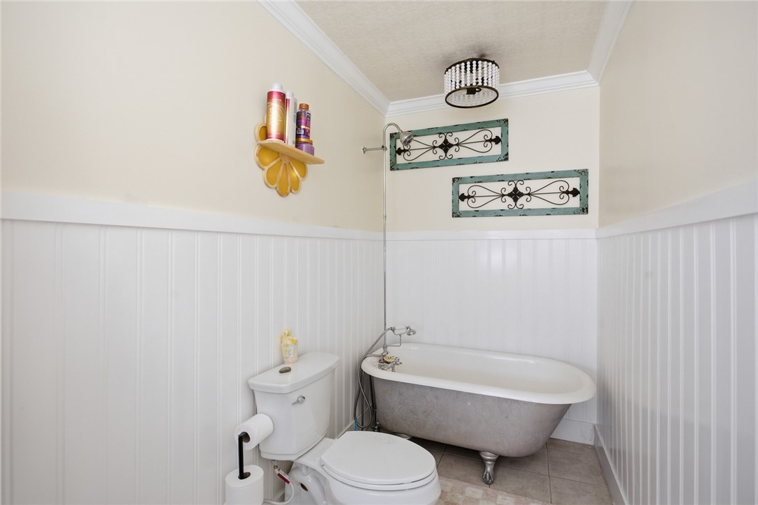 311 Cumberland Way Anderson, SC 29621 - Photo 17 of 44 Classic claw-foot tub creates a luxurious atmosphere in this well-appointed bathroom.