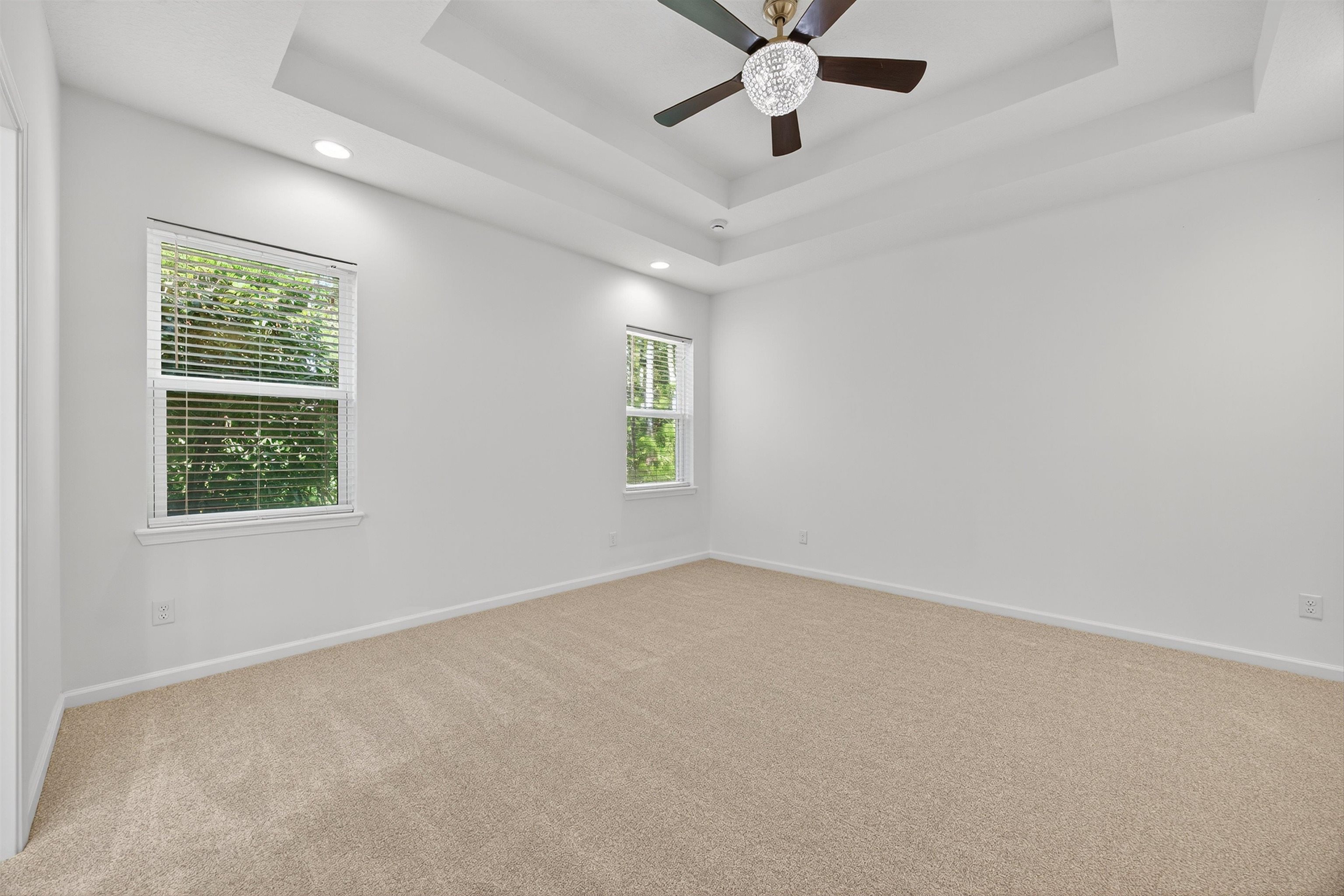 415 Balearics Drive St. Augustine, FL 32086 - Photo 14 of 30 an empty room with a window and a fan