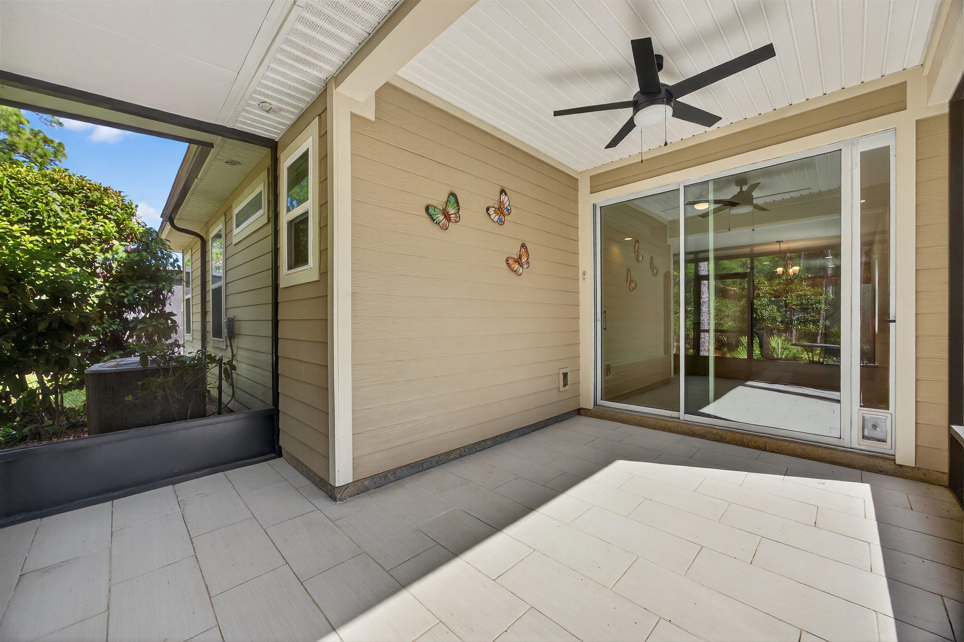 415 Balearics Drive St. Augustine, FL 32086 - Photo 25 of 30 a view of a hallway with a glass door