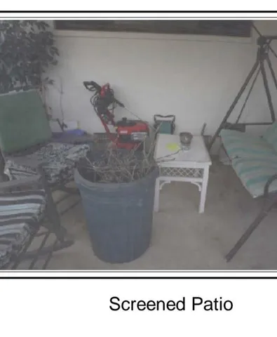 a black and white photo of a living room