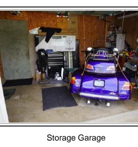 a bedroom with a bed and a fireplace