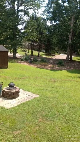 a fire hydrant in the middle of a field