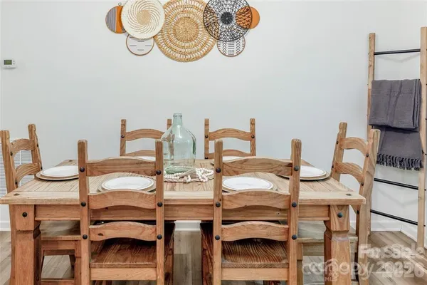 a view of a dining room with furniture