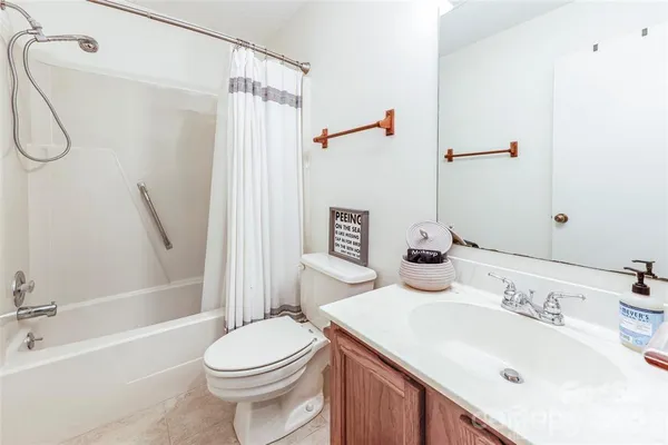 a view of balcony with wooden floor and outdoor seating