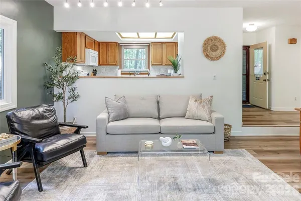 a living room with furniture and a table