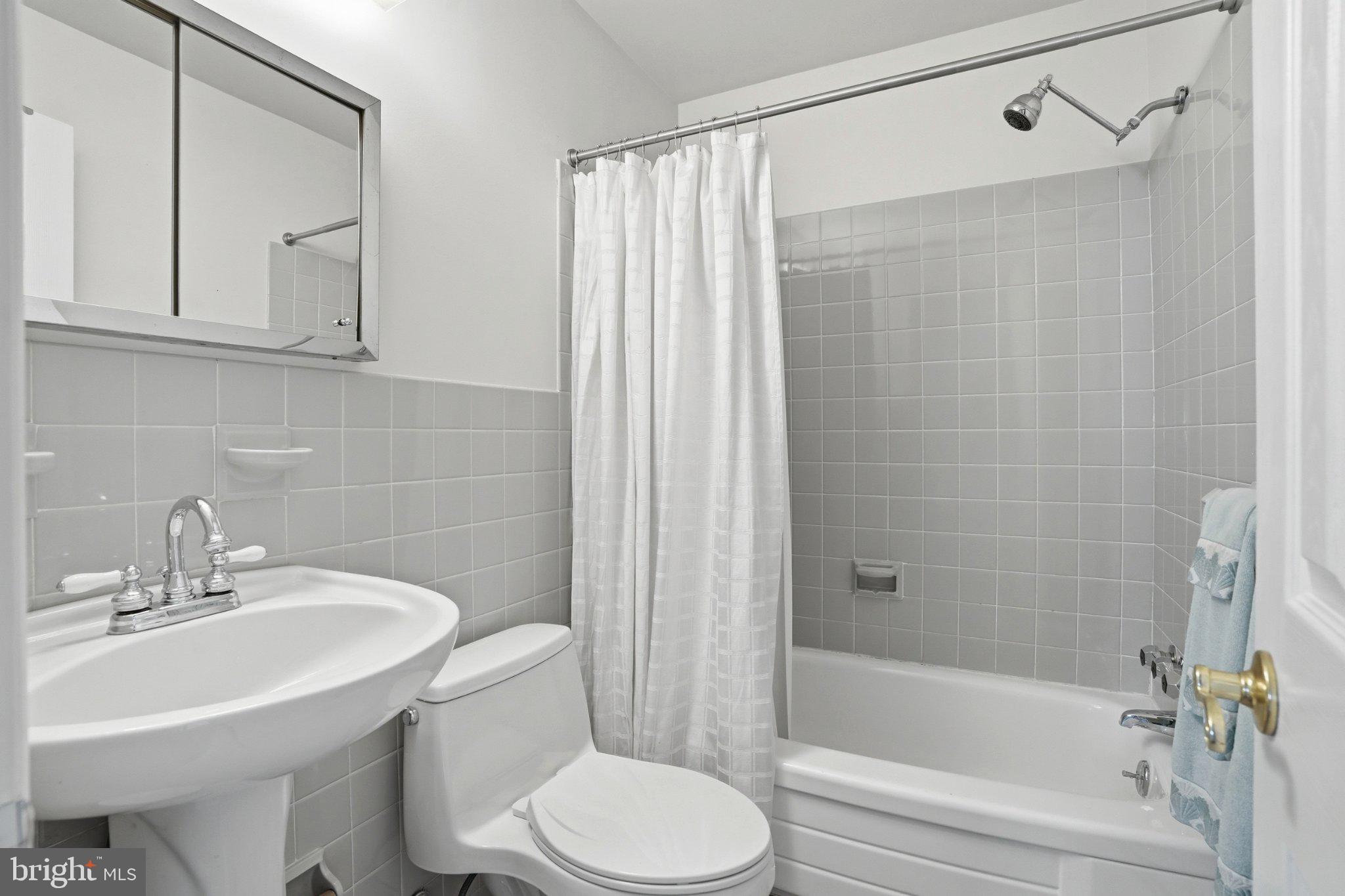 1624 Dillon Road Ambler, PA 19002 - Photo 18 of 47 a bathroom with a sink toilet and shower