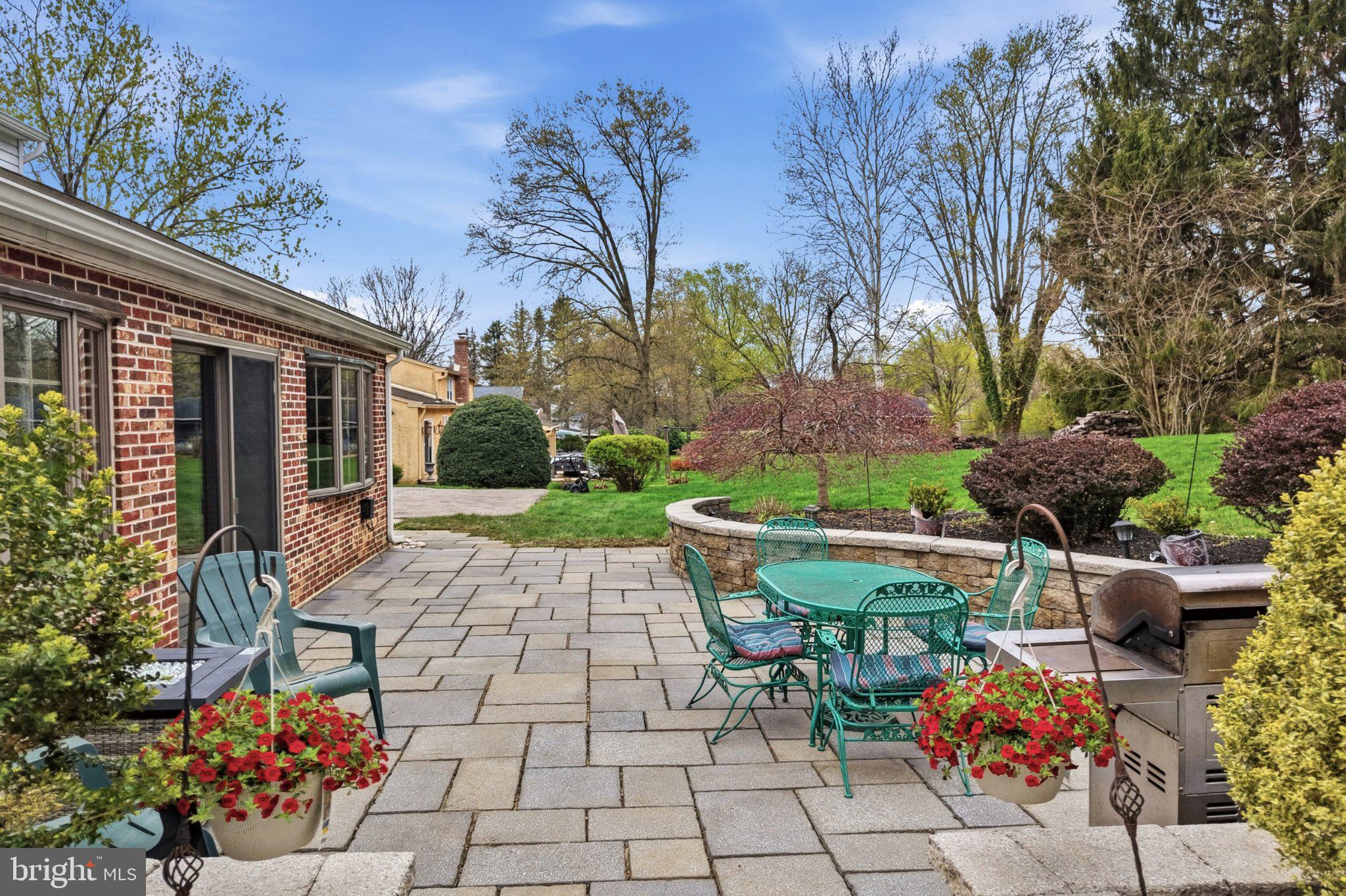 1624 Dillon Road Ambler, PA 19002 - Photo 40 of 47 a view of backyard with sitting area and garden