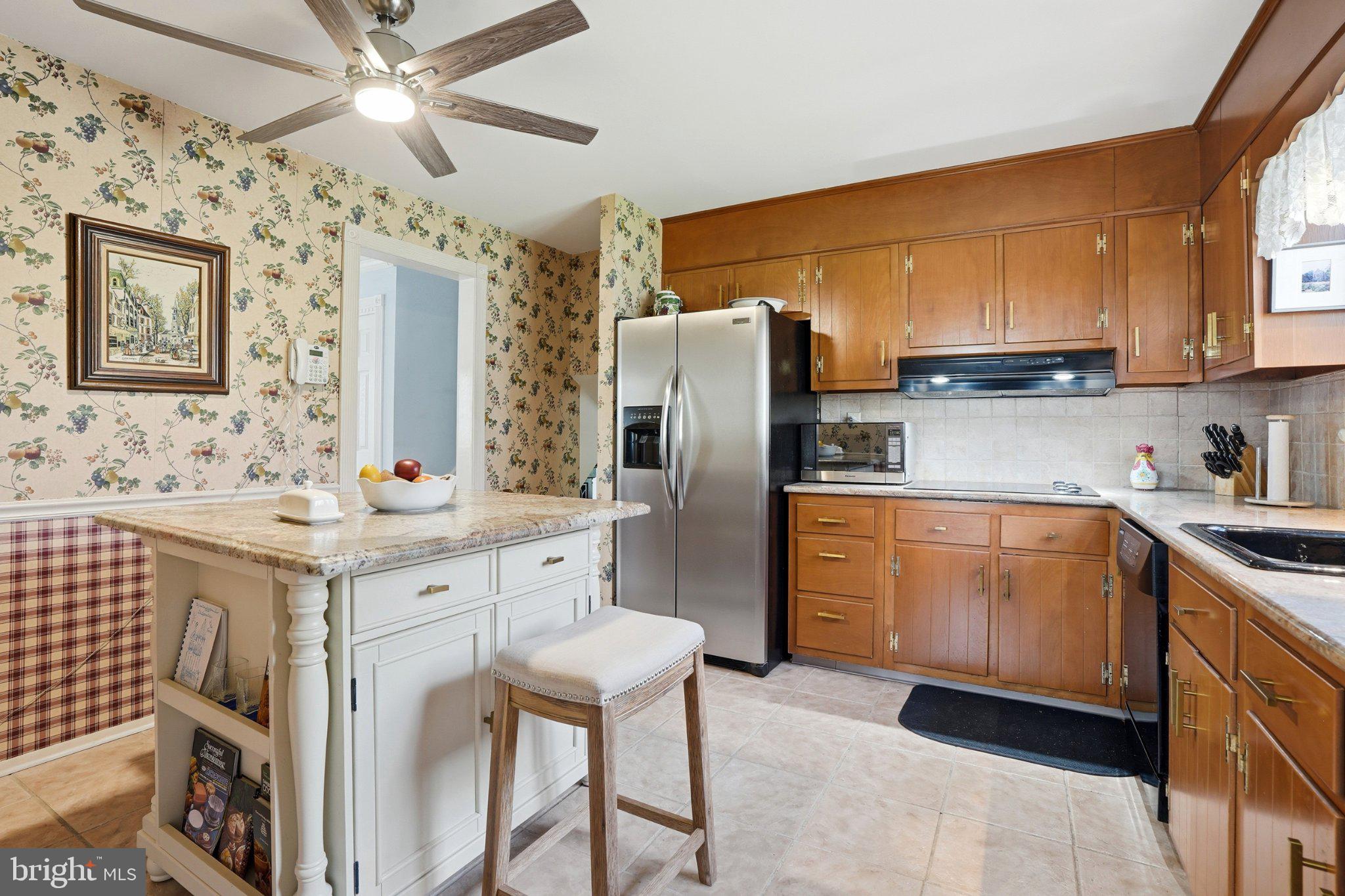 1624 Dillon Road Ambler, PA 19002 - Photo 10 of 47 a kitchen with stainless steel appliances granite countertop a sink stove and refrigerator