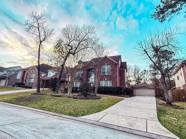 a view of a building with a yard