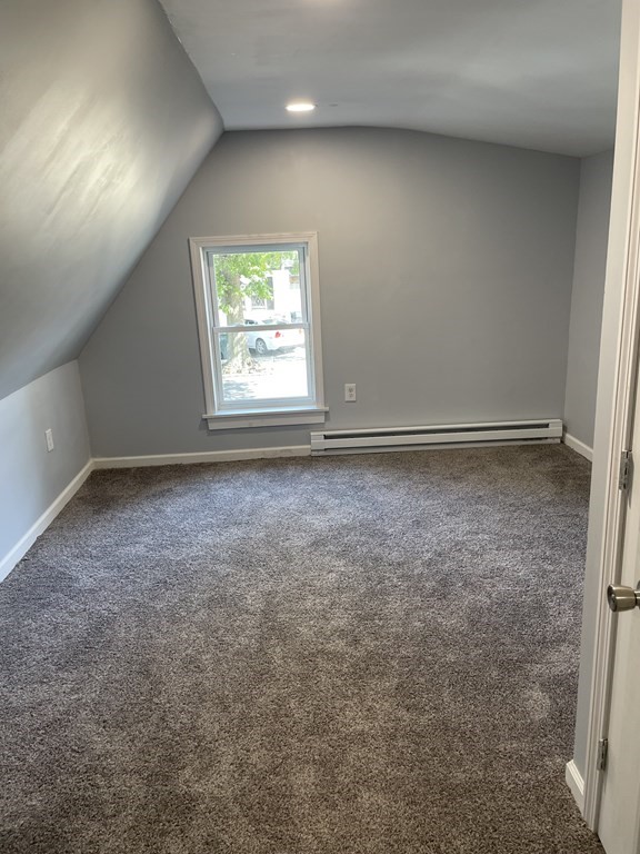 408 Nottingham Street Springfield, MA 01104 - Photo 8 of 12 an empty room with a window