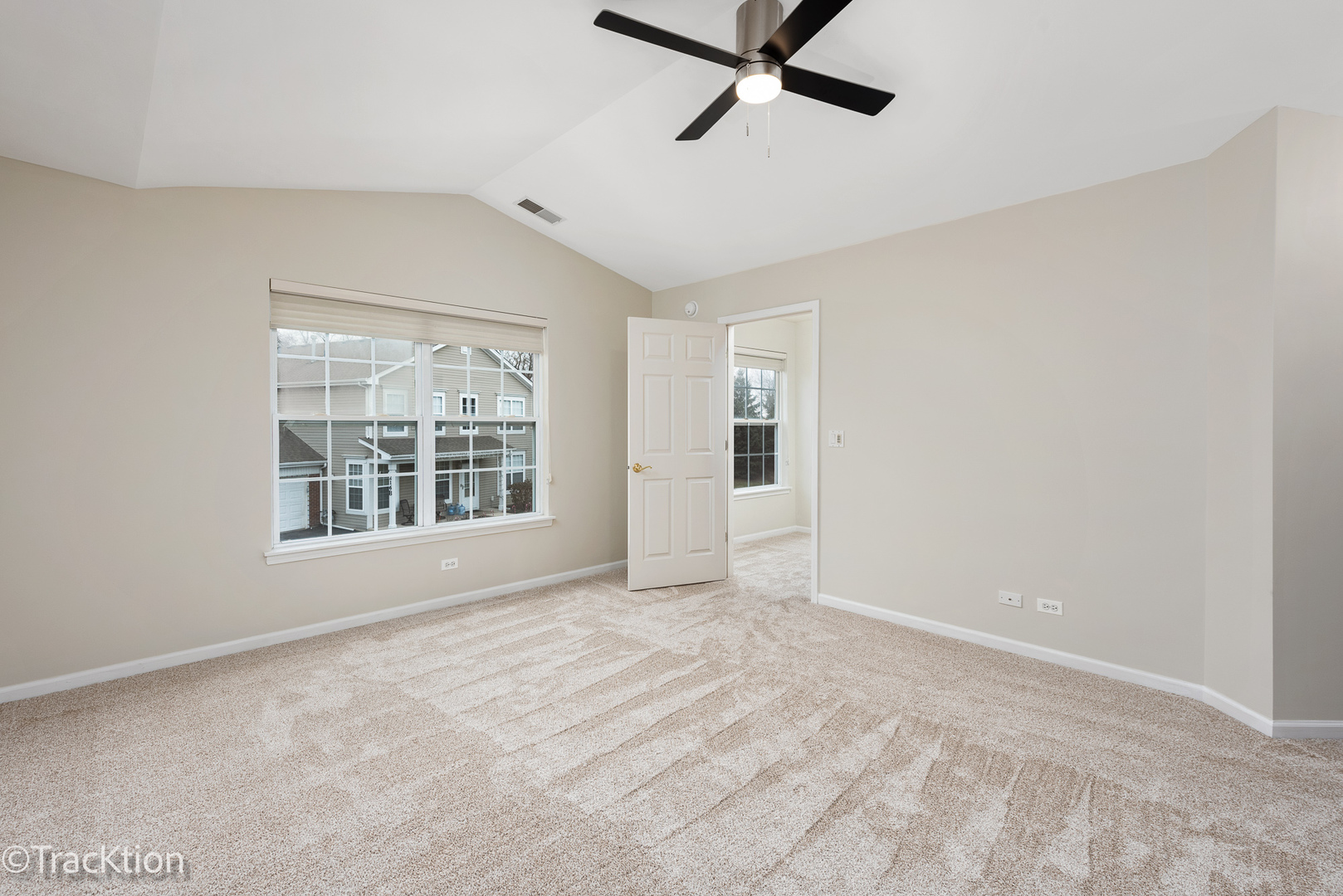 220 Brompton Lane, Unit A Sugar Grove, IL 60554 - Photo 12 of 19 a view of an empty room with a window