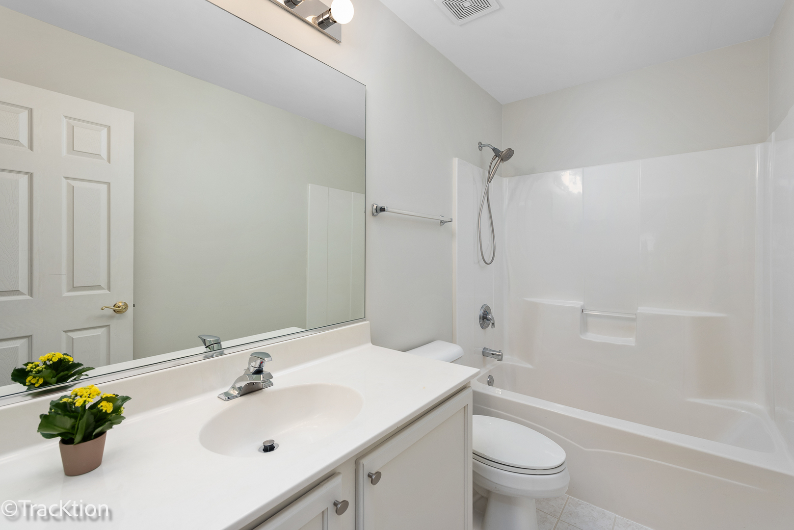 220 Brompton Lane, Unit A Sugar Grove, IL 60554 - Photo 13 of 19 a bathroom with a sink toilet and shower