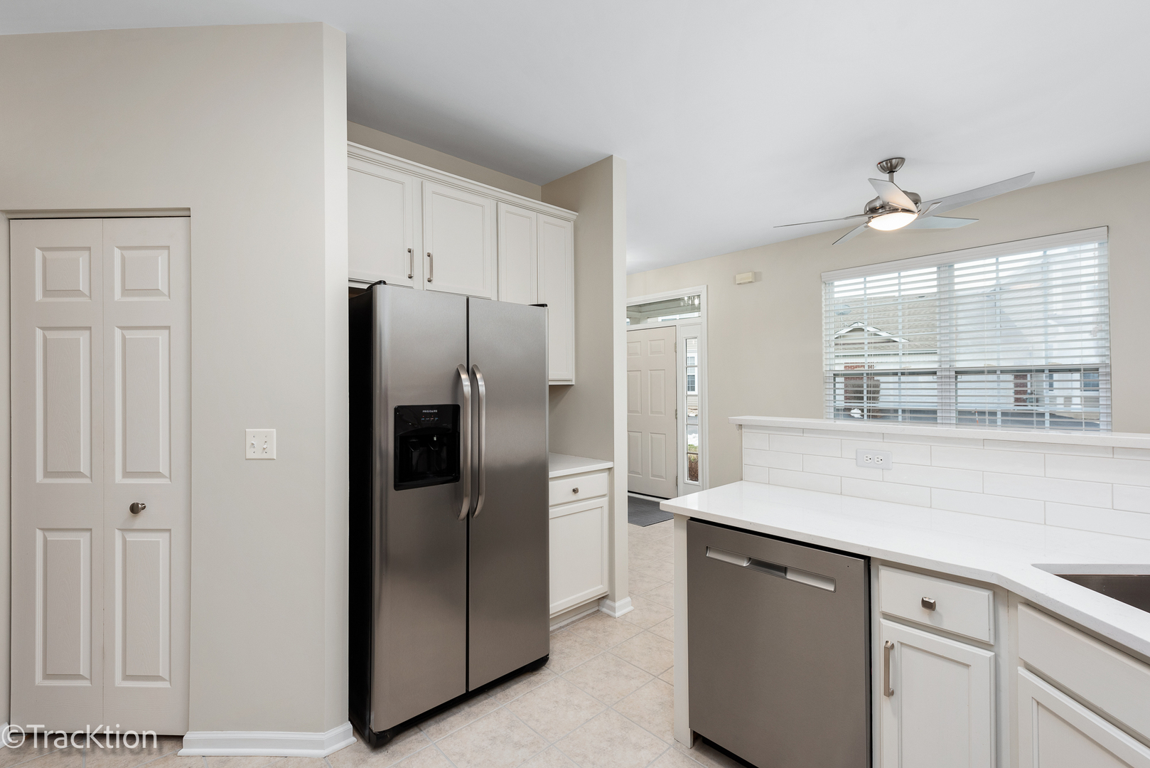 220 Brompton Lane, Unit A Sugar Grove, IL 60554 - Photo 4 of 19 a kitchen with stainless steel appliances a refrigerator and a sink