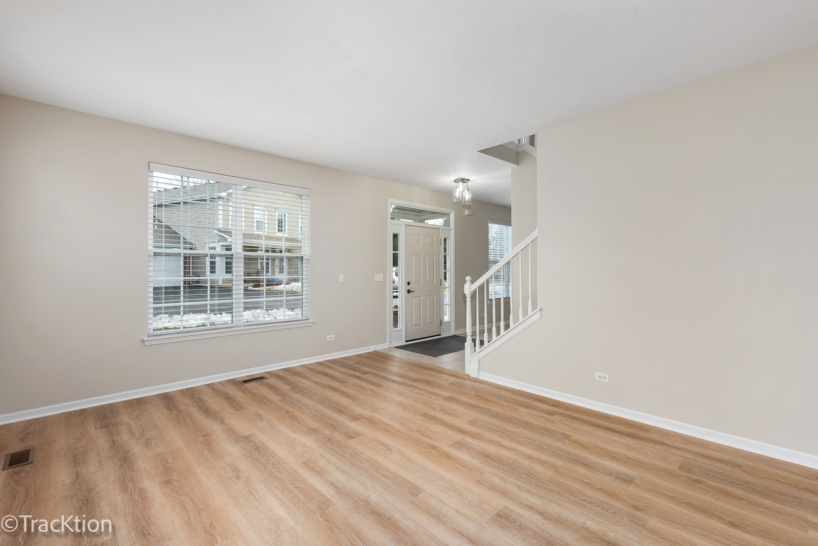 220 Brompton Lane, Unit A Sugar Grove, IL 60554 - Photo 6 of 19 a view of an empty room with a window