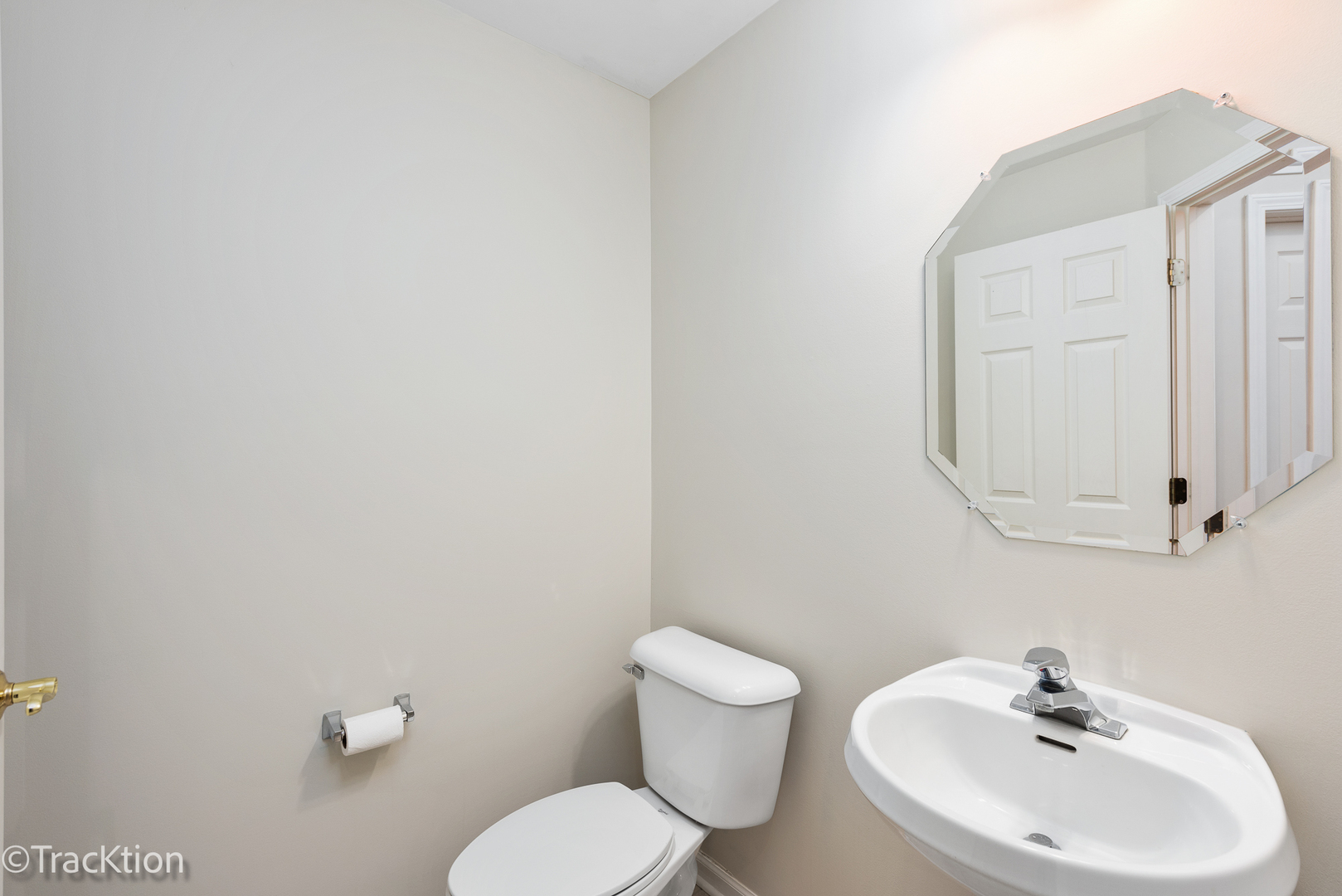 220 Brompton Lane, Unit A Sugar Grove, IL 60554 - Photo 8 of 19 a bathroom with a sink mirror and toilet