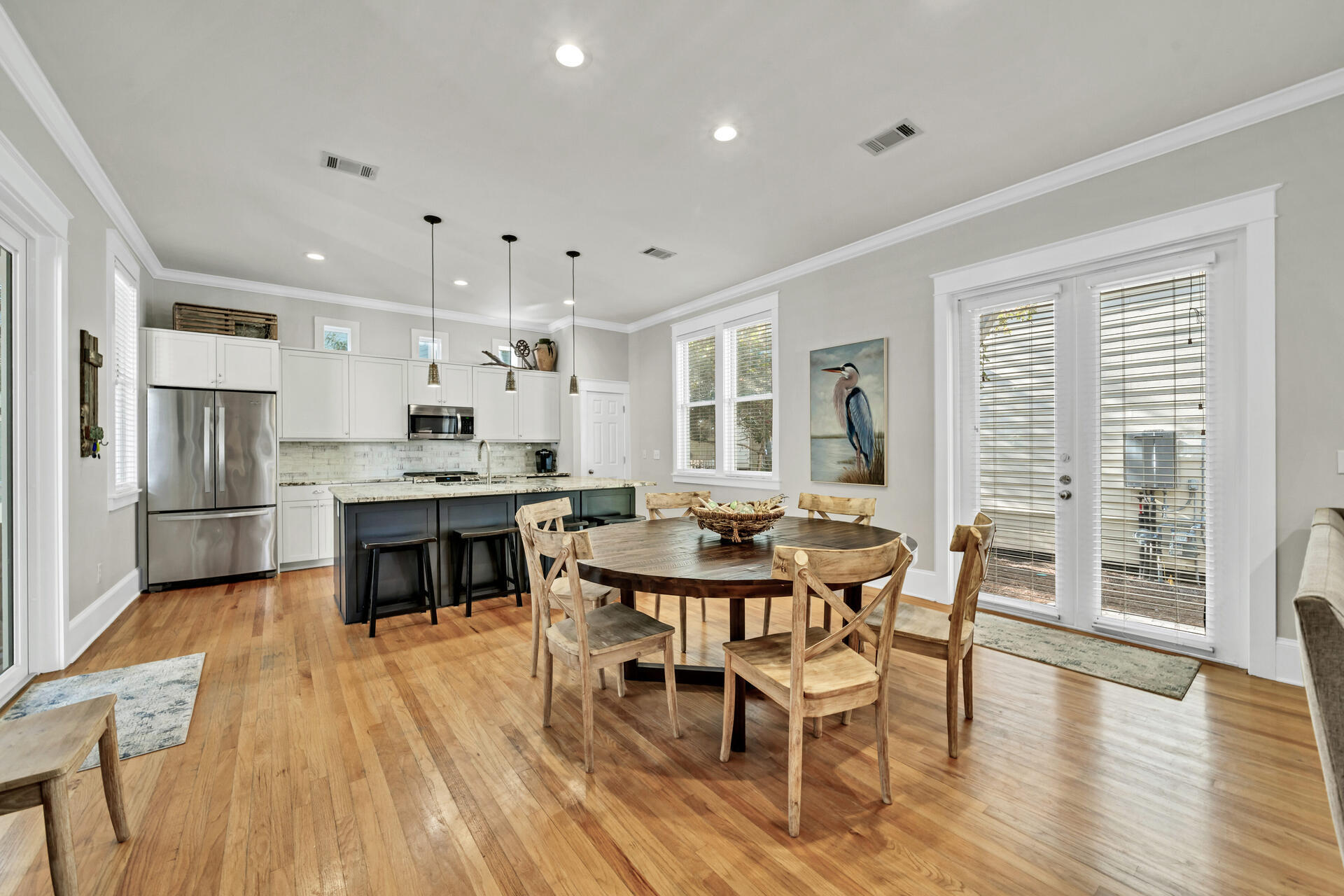 107 Chelsea Loop Road Santa Rosa Beach, FL 32459 - Photo 13 of 66 a view of a dining room with furniture and wooden floor