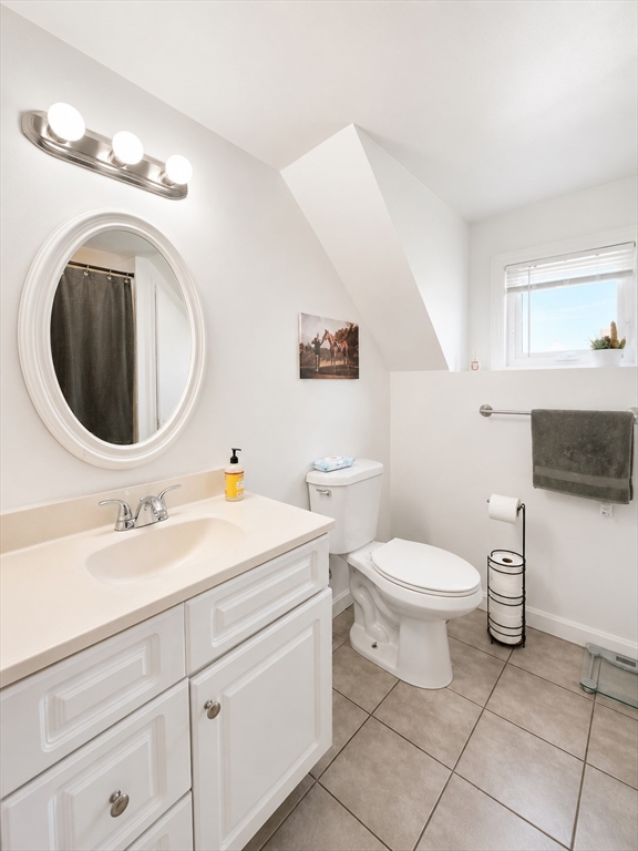5 Myrtle Street, Unit 3 Saugus, MA 01906 - Photo 14 of 15 a bathroom with a sink and a mirror