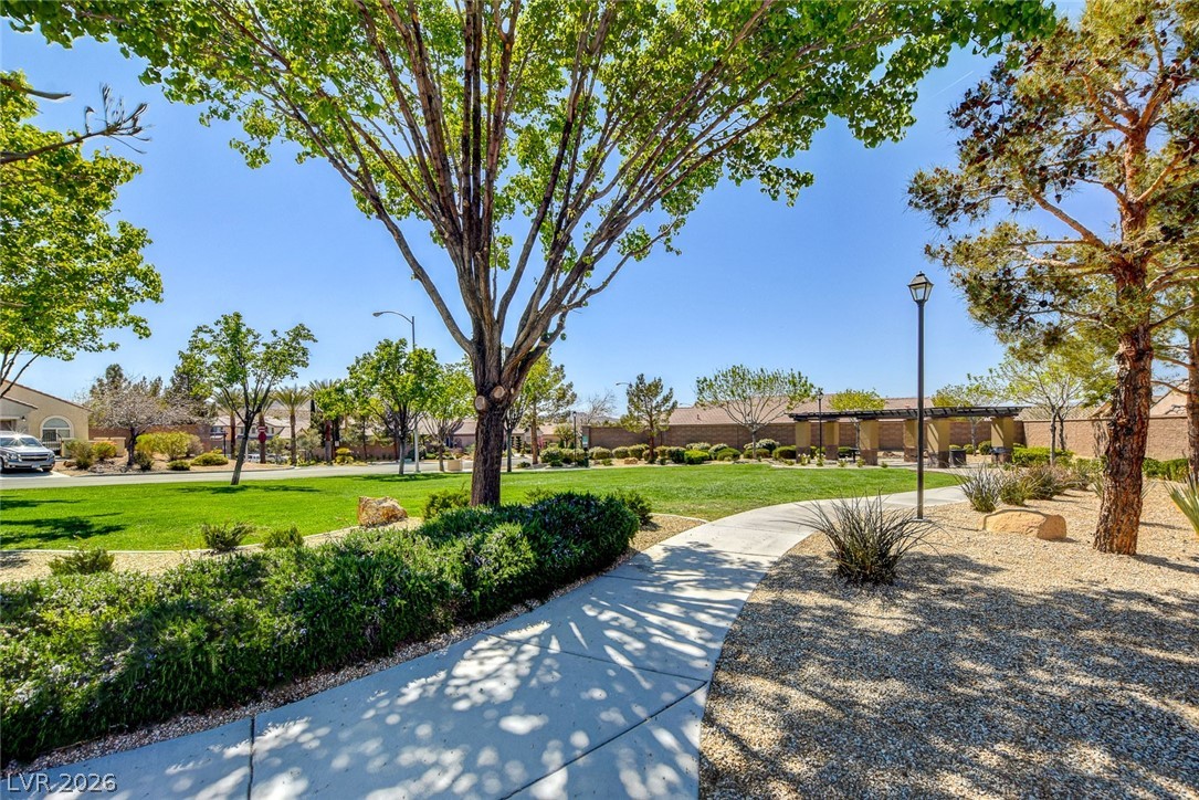 2793 Rosenhearty Drive Henderson, NV 89044 - Photo 75 of 85 A well-maintained community park features ample green space and a shaded gathering area.