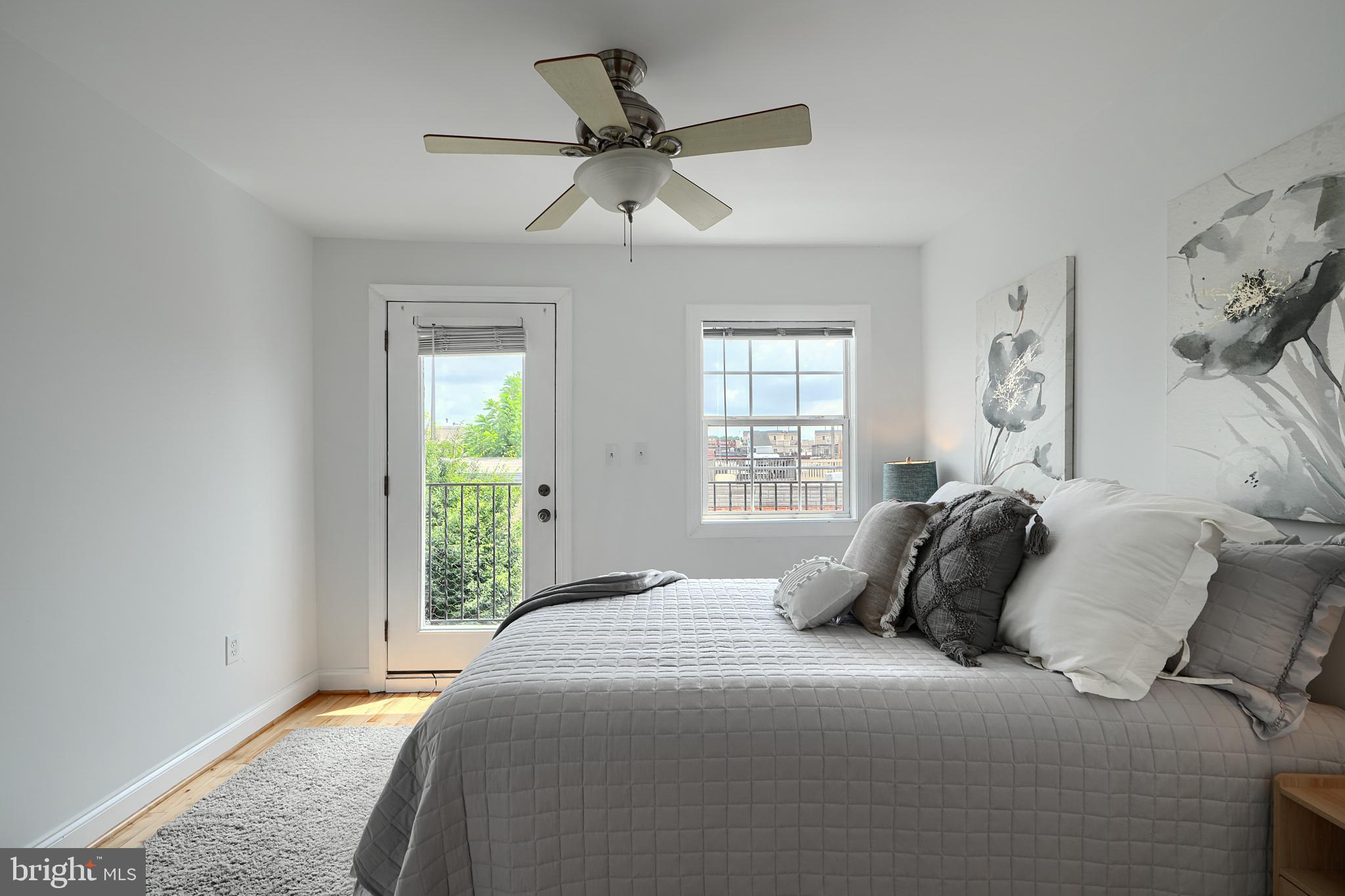 1600 Patapsco Street Baltimore, MD 21230 - Photo 28 of 40 a bedroom with a bed and window