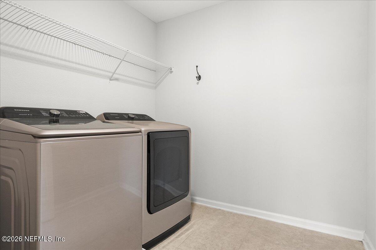 5645 Hampton Creek Road Jacksonville, FL 32218 - Photo 23 of 41 Laundry Room Upstairs