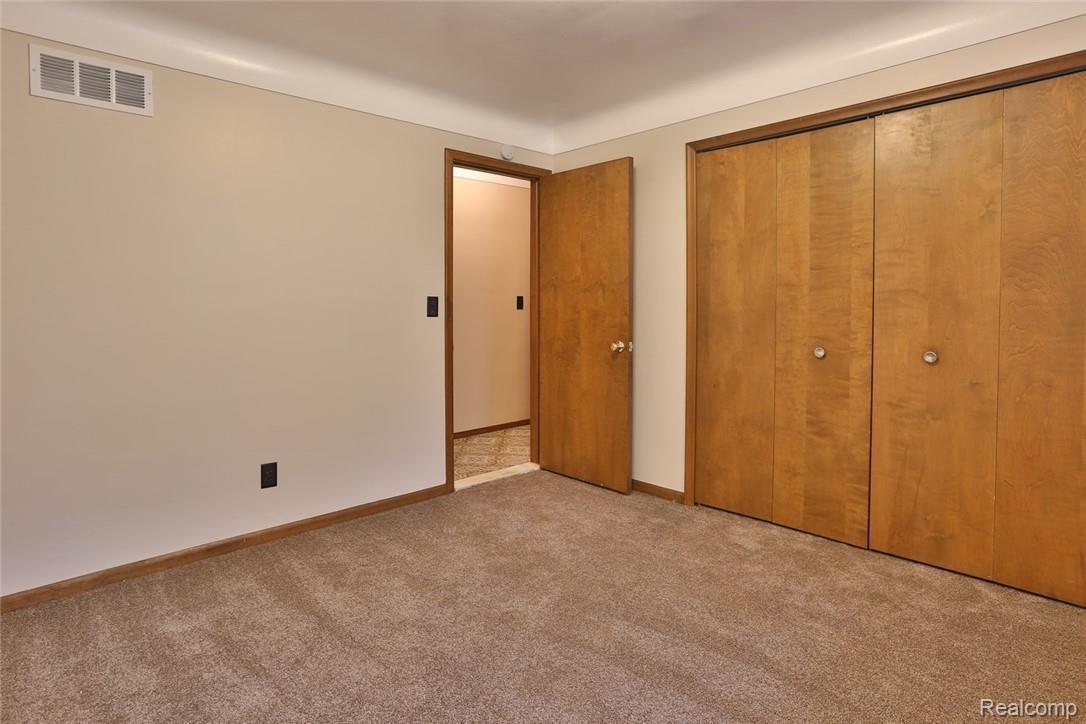 23490 King Road Trenton, MI 48183 - Photo 13 of 23 Bedroom 1 with new carpet and large closet