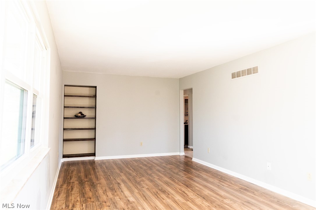 802 Dutch Ridge Road Parkersburg, WV 26104 - Photo 11 of 25 Living room with built in features and light hardwood / wood-style floors