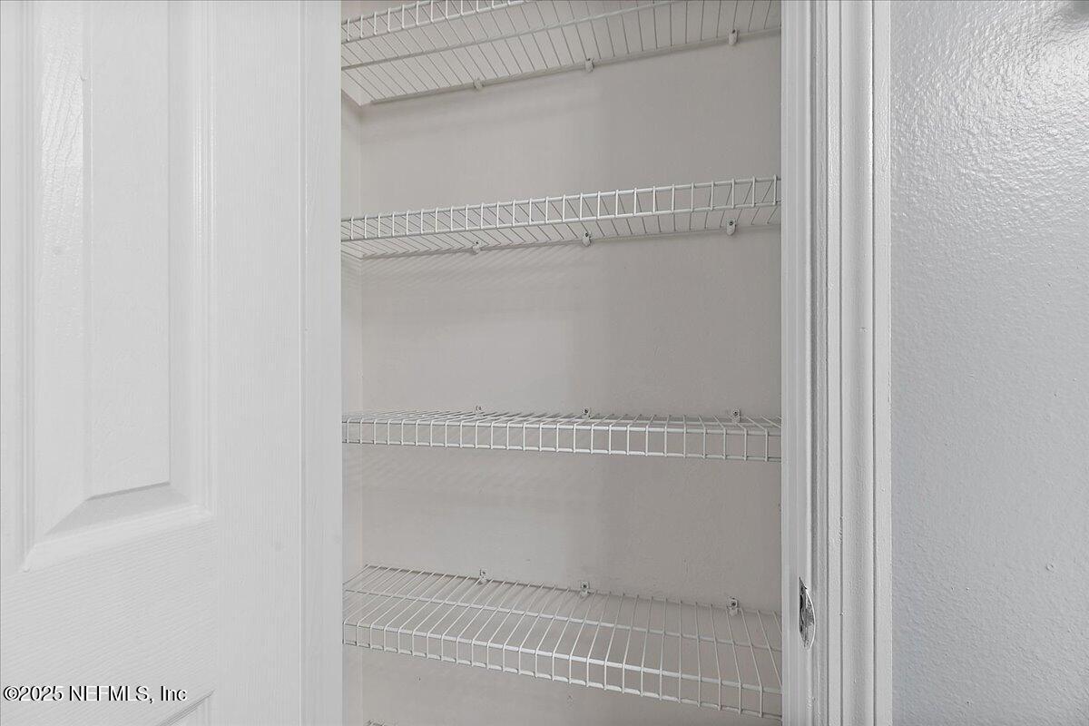 160 Veracruz Drive, Unit 422 Ponte Vedra Beach, FL 32082 - Photo 13 of 26 a bathroom with a glass shower door