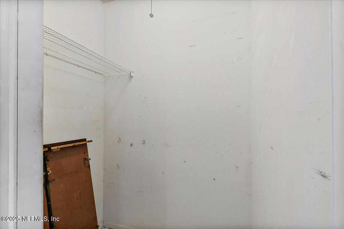 160 Veracruz Drive, Unit 422 Ponte Vedra Beach, FL 32082 - Photo 15 of 26 close up of a white marble wall