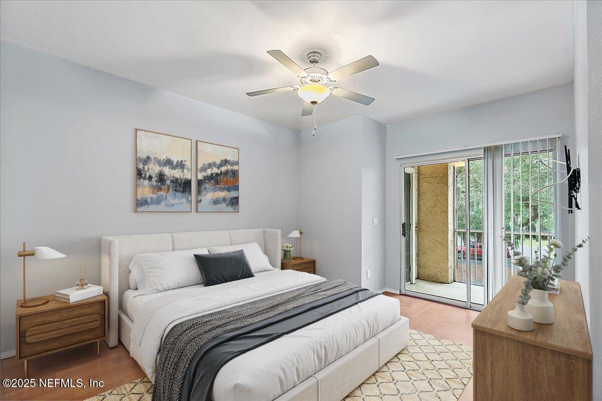 160 Veracruz Drive, Unit 422 Ponte Vedra Beach, FL 32082 - Photo 9 of 26 a bedroom with a large bed and a window