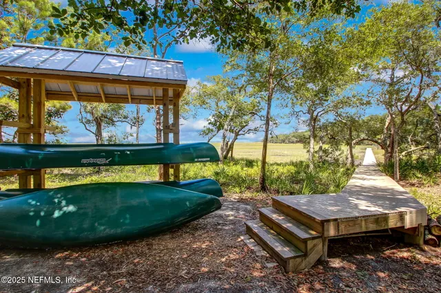 a view of a lake from a yard