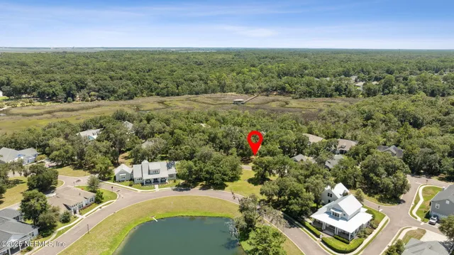 a view of a houses with a yard