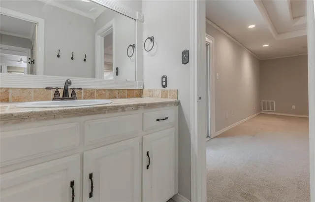 a view of a backyard with pathway