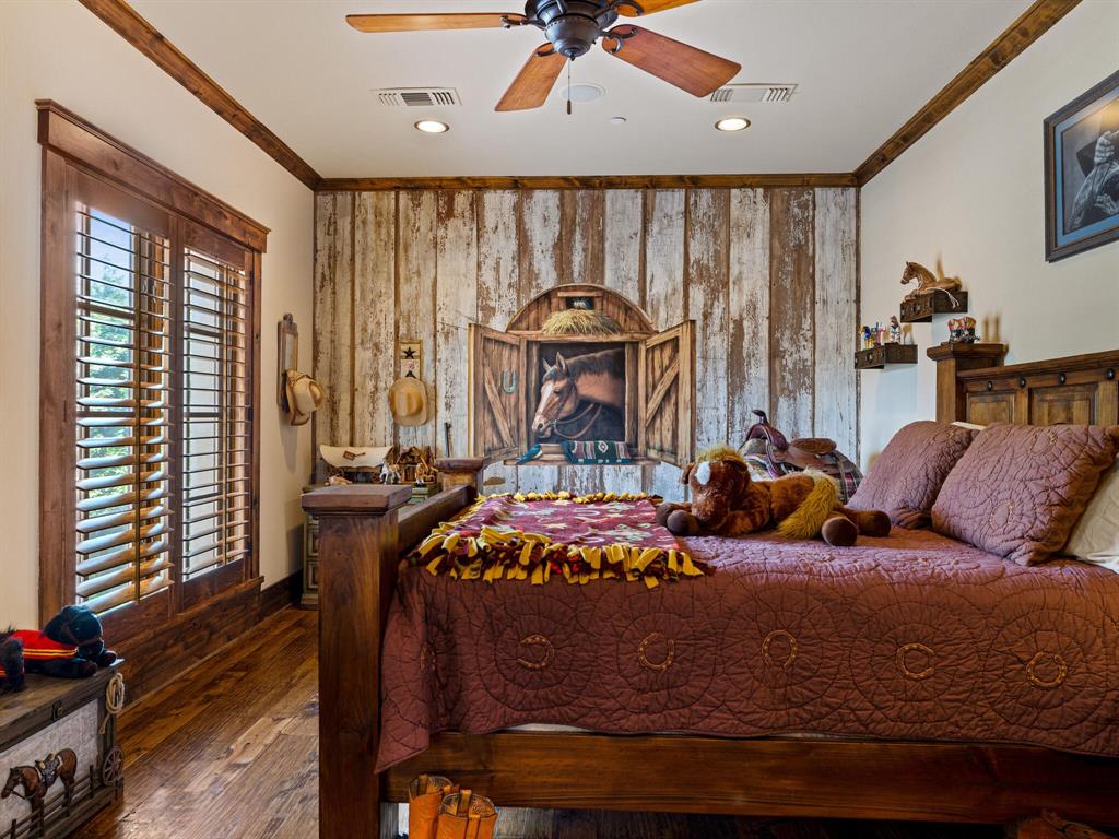 2115 Paradise Rnch Trail McKinney, TX 75071 - Photo 22 of 40 a bed sitting in a bedroom next to a window