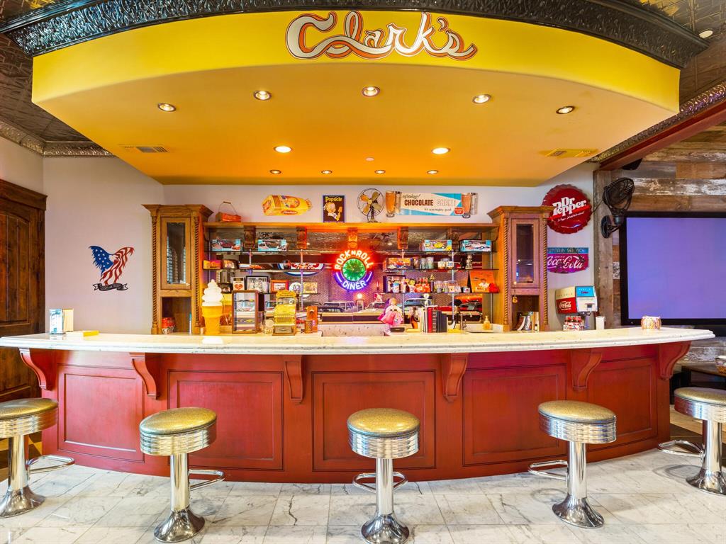 2115 Paradise Rnch Trail McKinney, TX 75071 - Photo 25 of 40 a room with furniture and tables