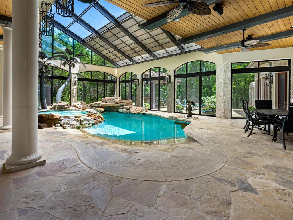 2115 Paradise Rnch Trail McKinney, TX 75071 - Photo 29 of 40 a view of a patio with table and chairs next to a yard