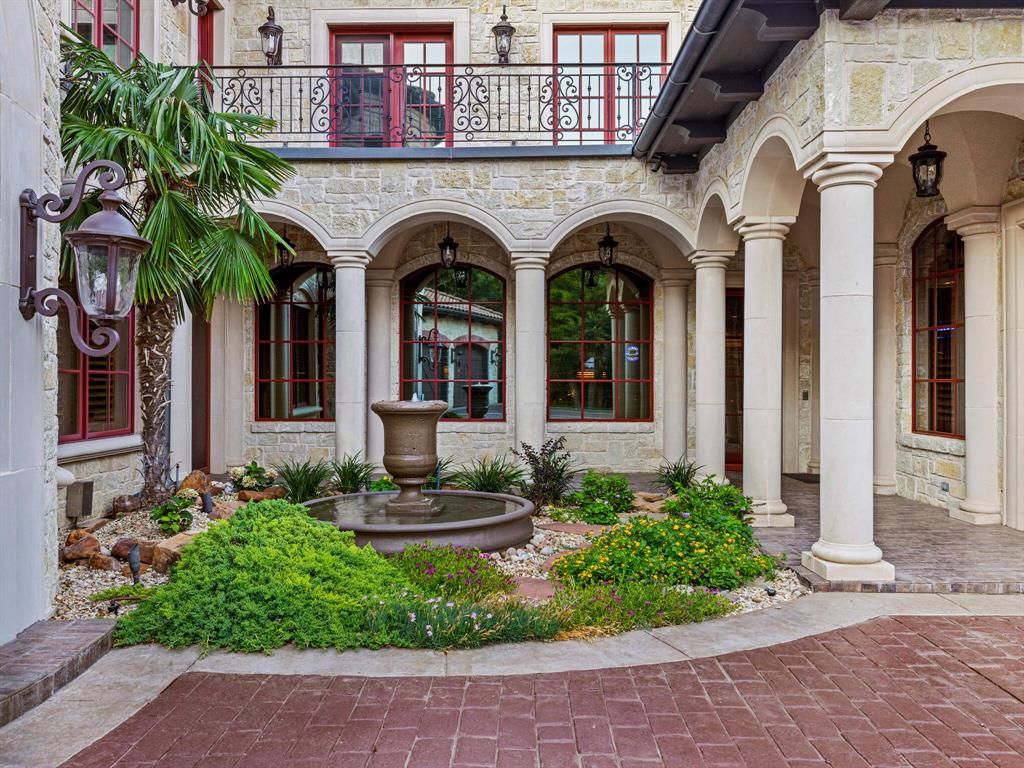 2115 Paradise Rnch Trail McKinney, TX 75071 - Photo 39 of 40 a front view of a house with garden